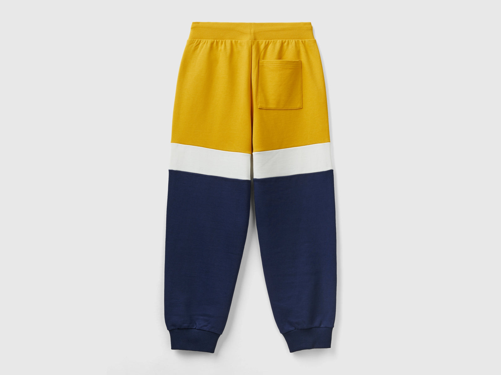 Joggers ocra e blu scuro da uomo giallo 2 | Benetton Outlet