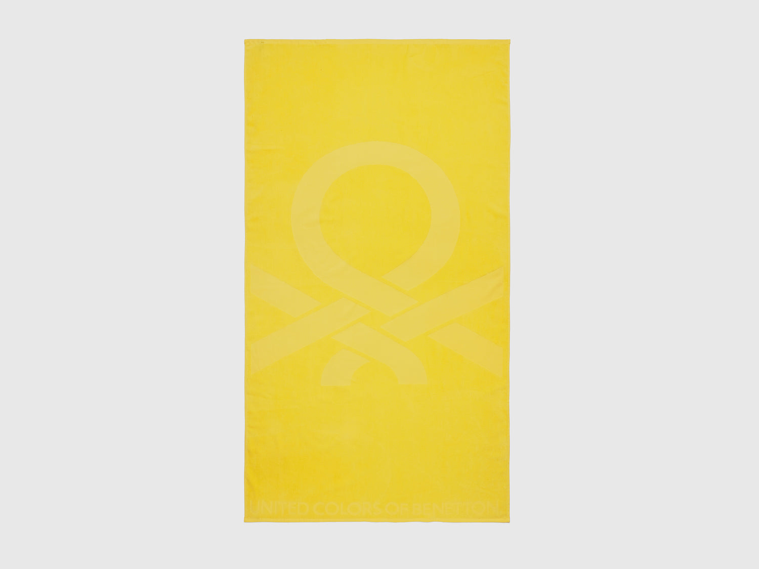 Telo mare in spugna da uomo giallo | Benetton Outlet