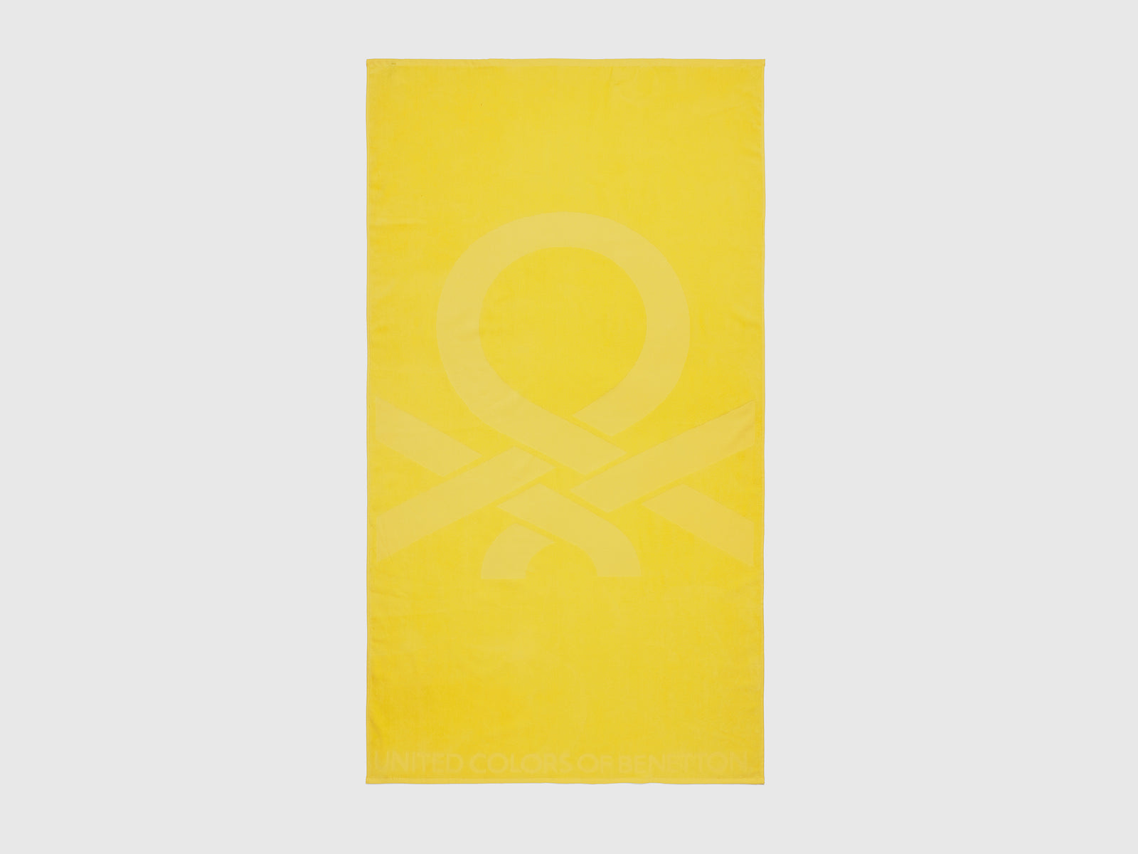 Telo mare in spugna da uomo giallo | Benetton Outlet