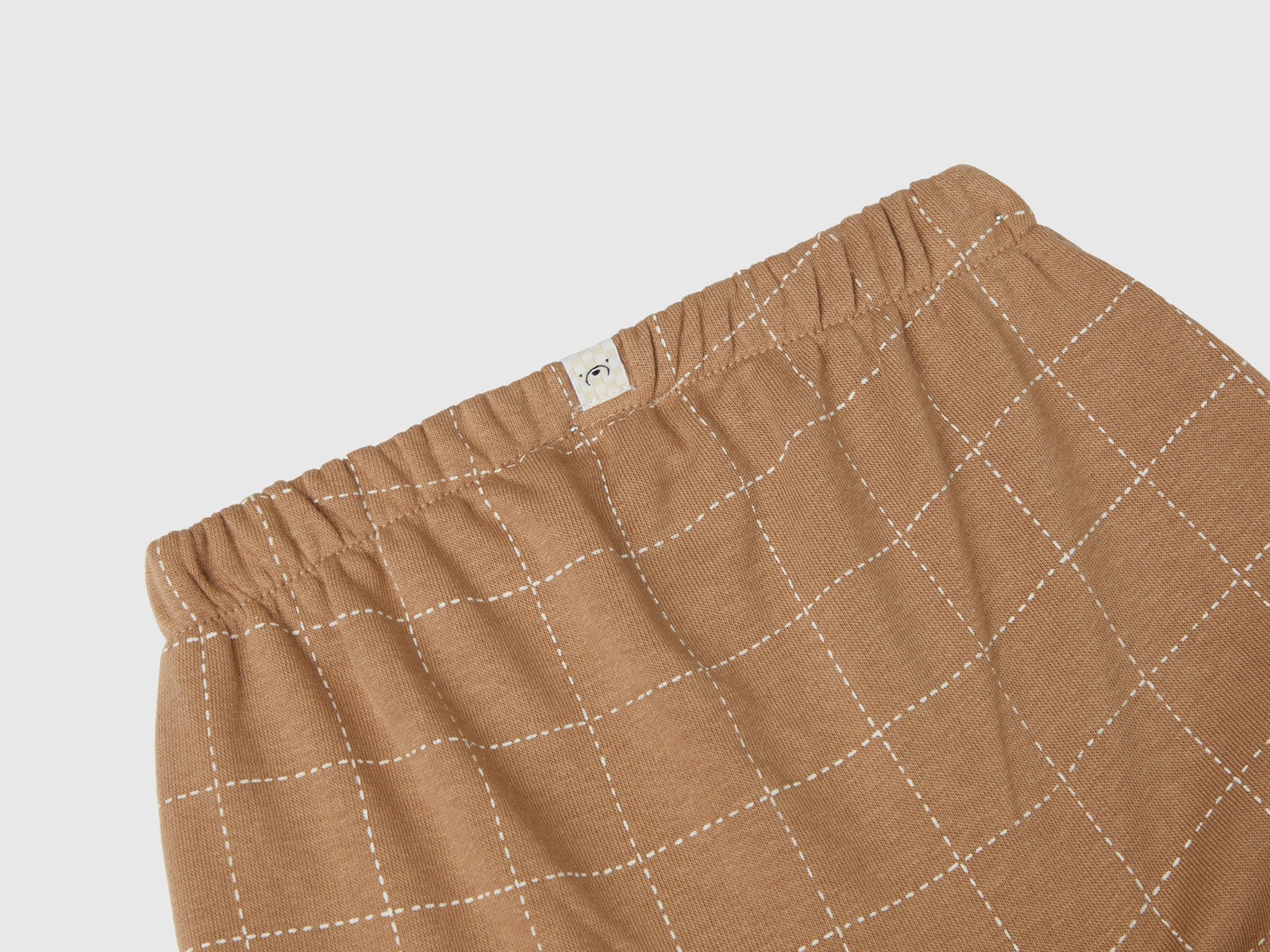 Pantaloni in felpa con bottoni da neonato bruciato 3 | Benetton Outlet