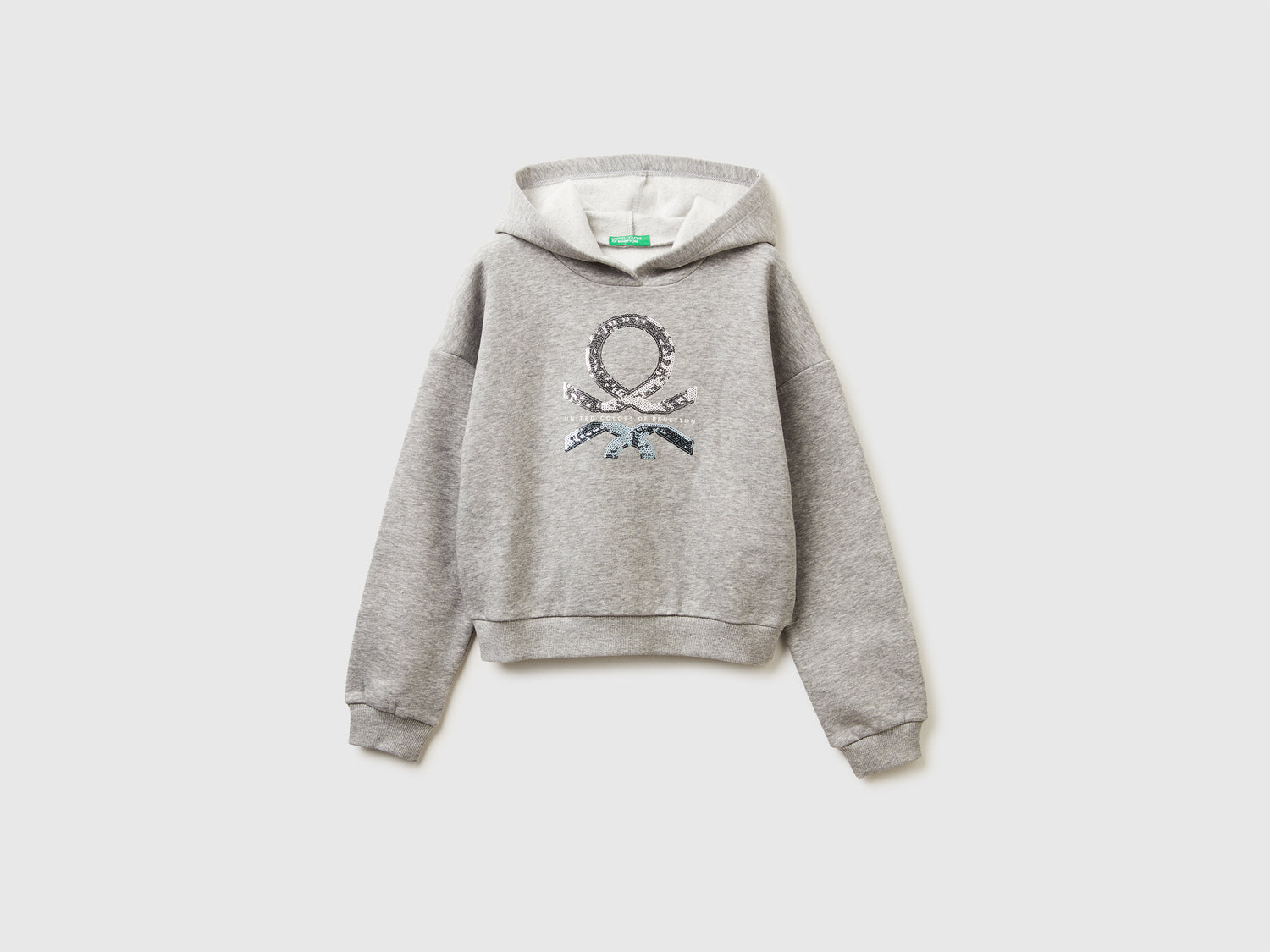 Felpa con cappuccio e paillettes da bambina grigio chiaro | Benetton Outlet