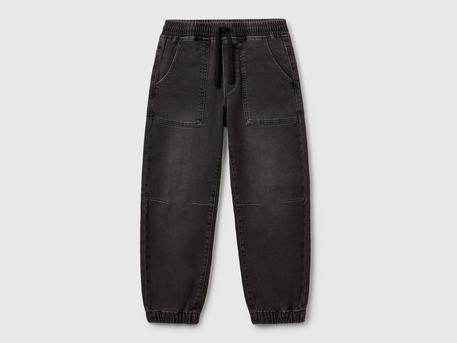 Joggers di jeans da bambino nero | Benetton Outlet