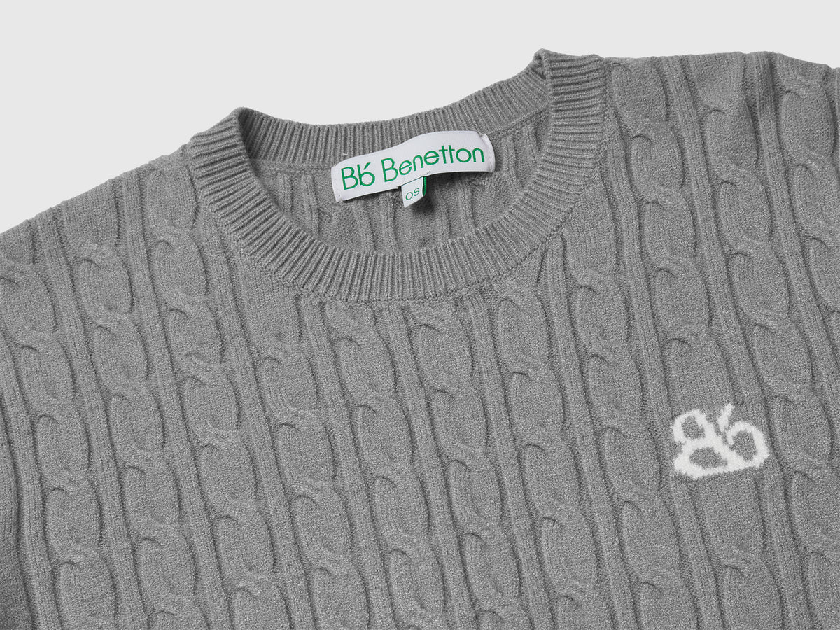 Maglione con trecce