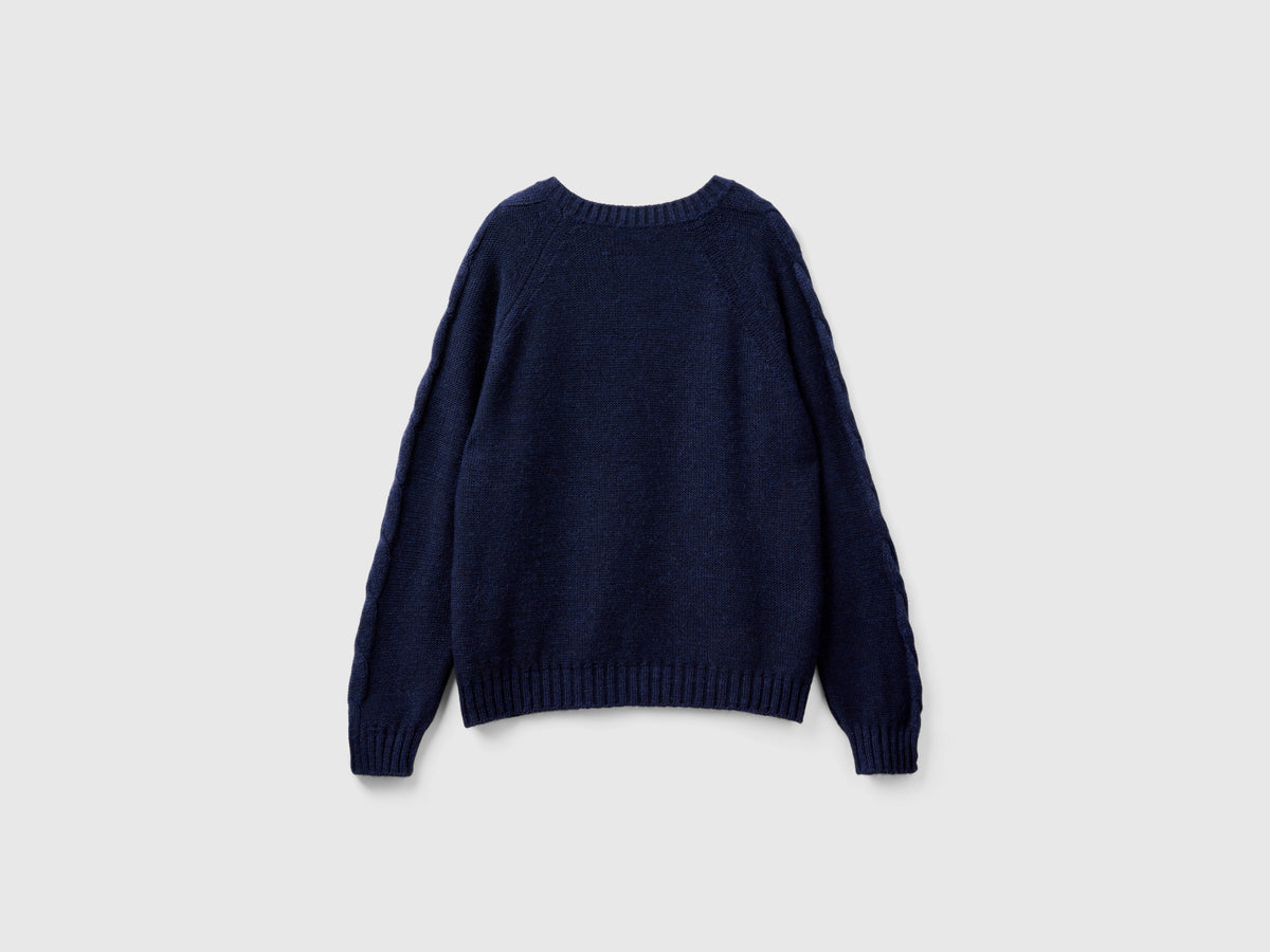 Maglione con trecce e losanghe