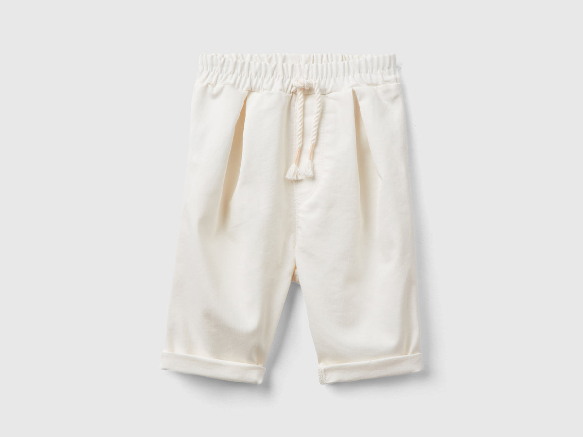 Pantaloni stretch con coulisse