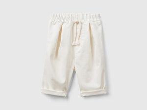Pantaloni stretch con coulisse