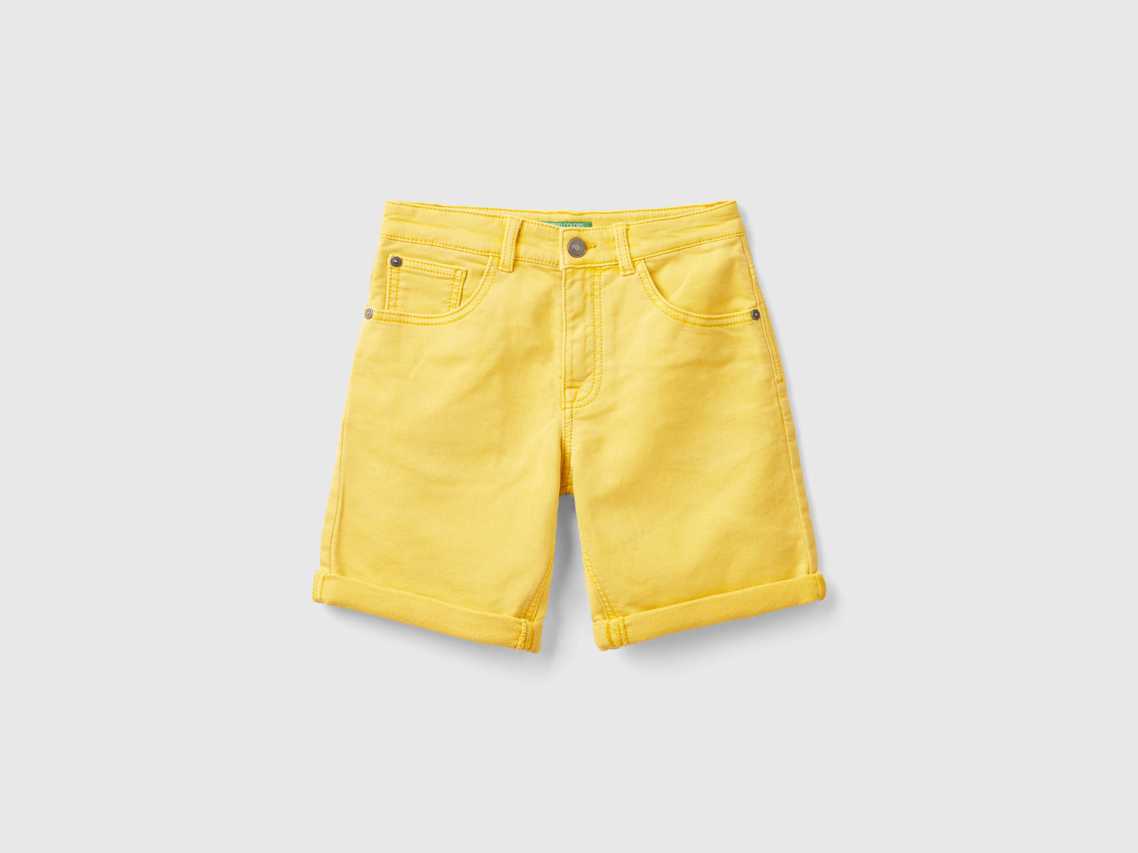 Bermuda slim fit da bambino giallo | Benetton Outlet