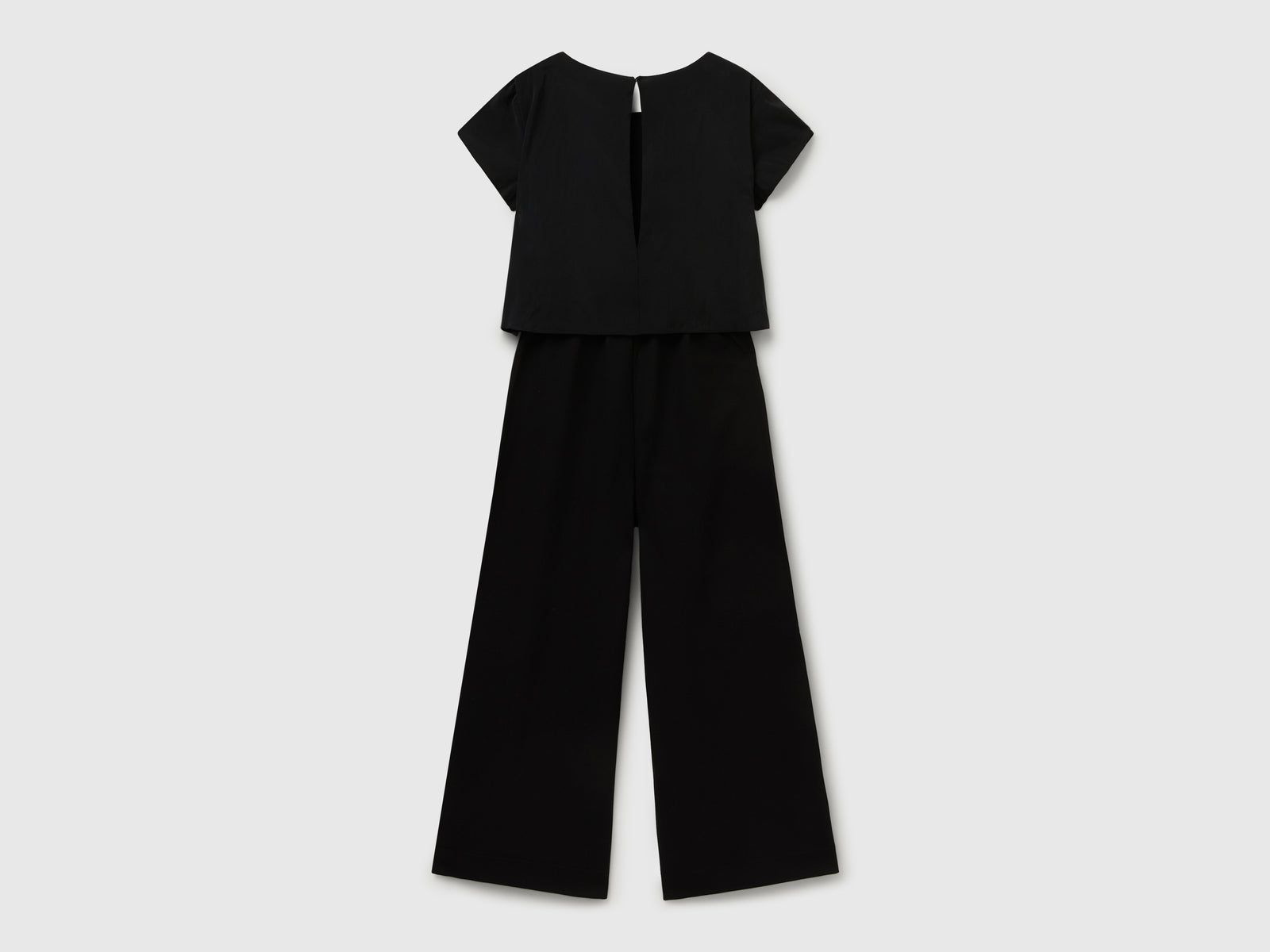 Tuta fluida a manica corta da bambina nero 2 | Benetton Outlet