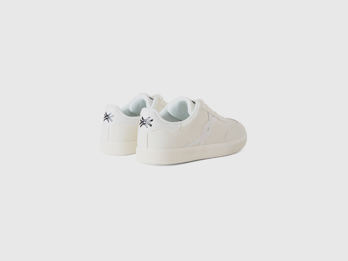Sneakers in tessuto spalmato