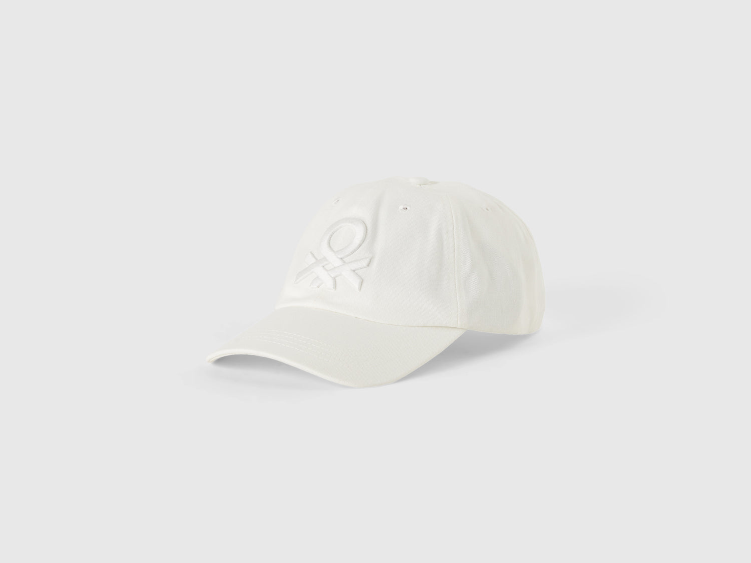 Cappello baseball effetto lavato da uomo bianco | Benetton Outlet