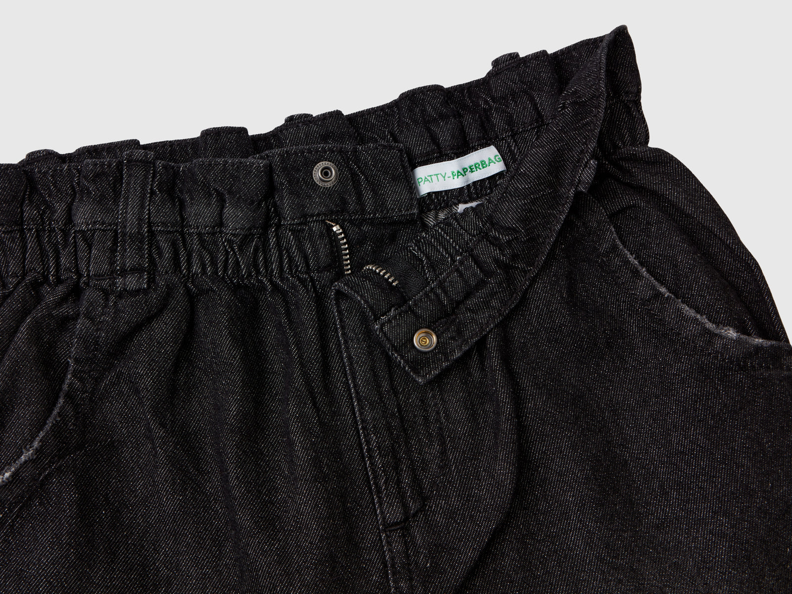 Jeans paperbag 100% cotone da bambina nero 3 | Benetton Outlet