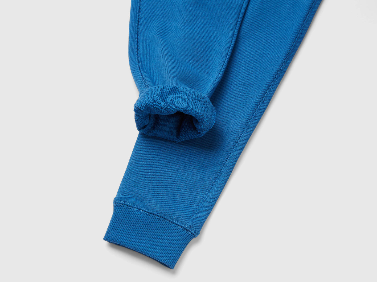 Pantaloni in felpa 100% cotone da bambino blu 2 | Benetton Outlet