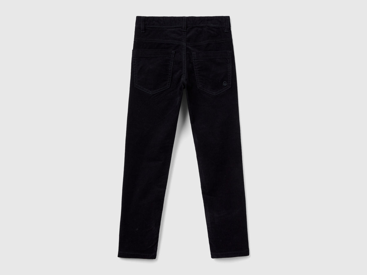 Pantaloni slim fit in velluto stretch