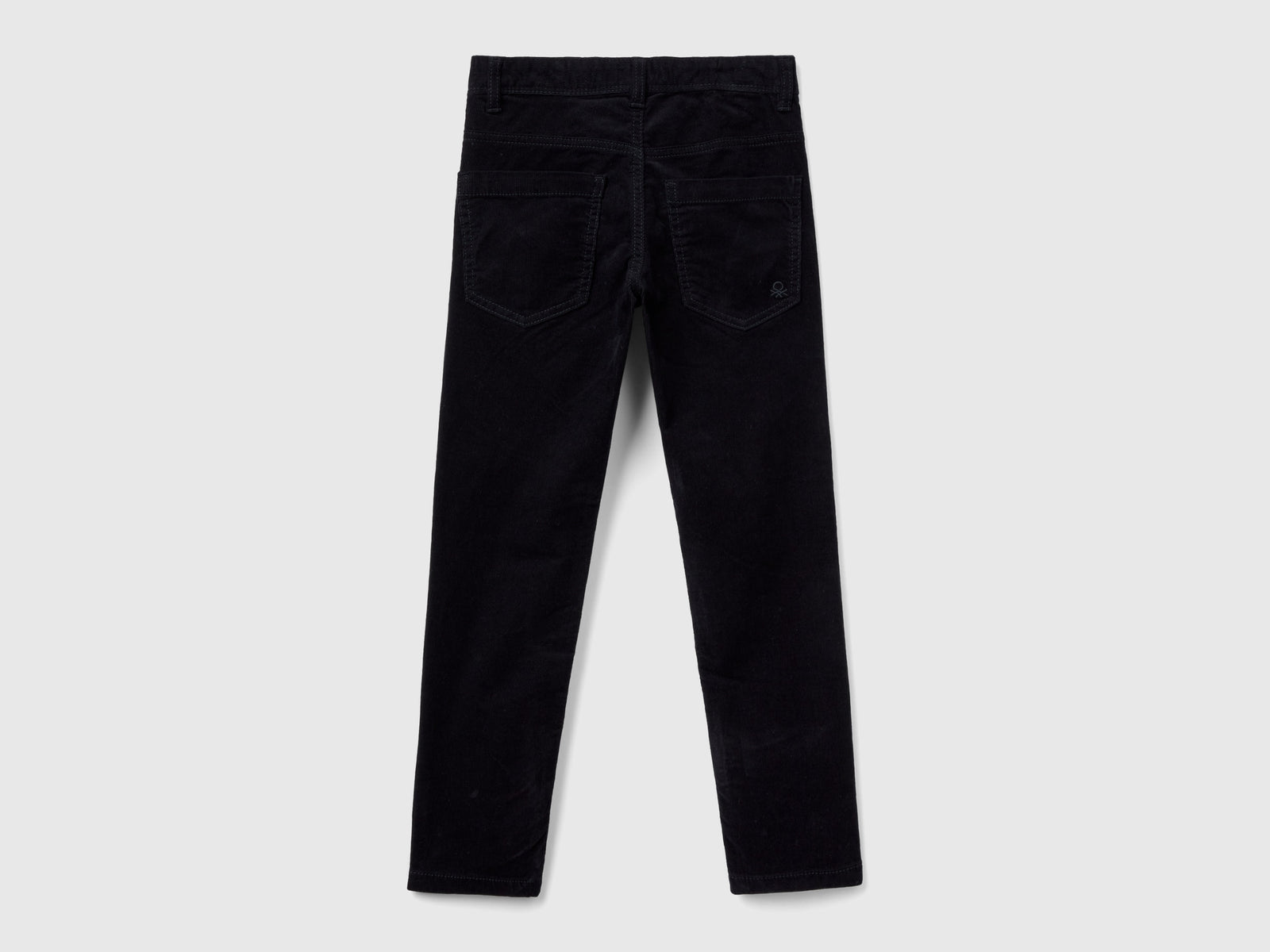 Pantaloni slim fit in velluto stretch da bambino nero 2 | Benetton Outlet