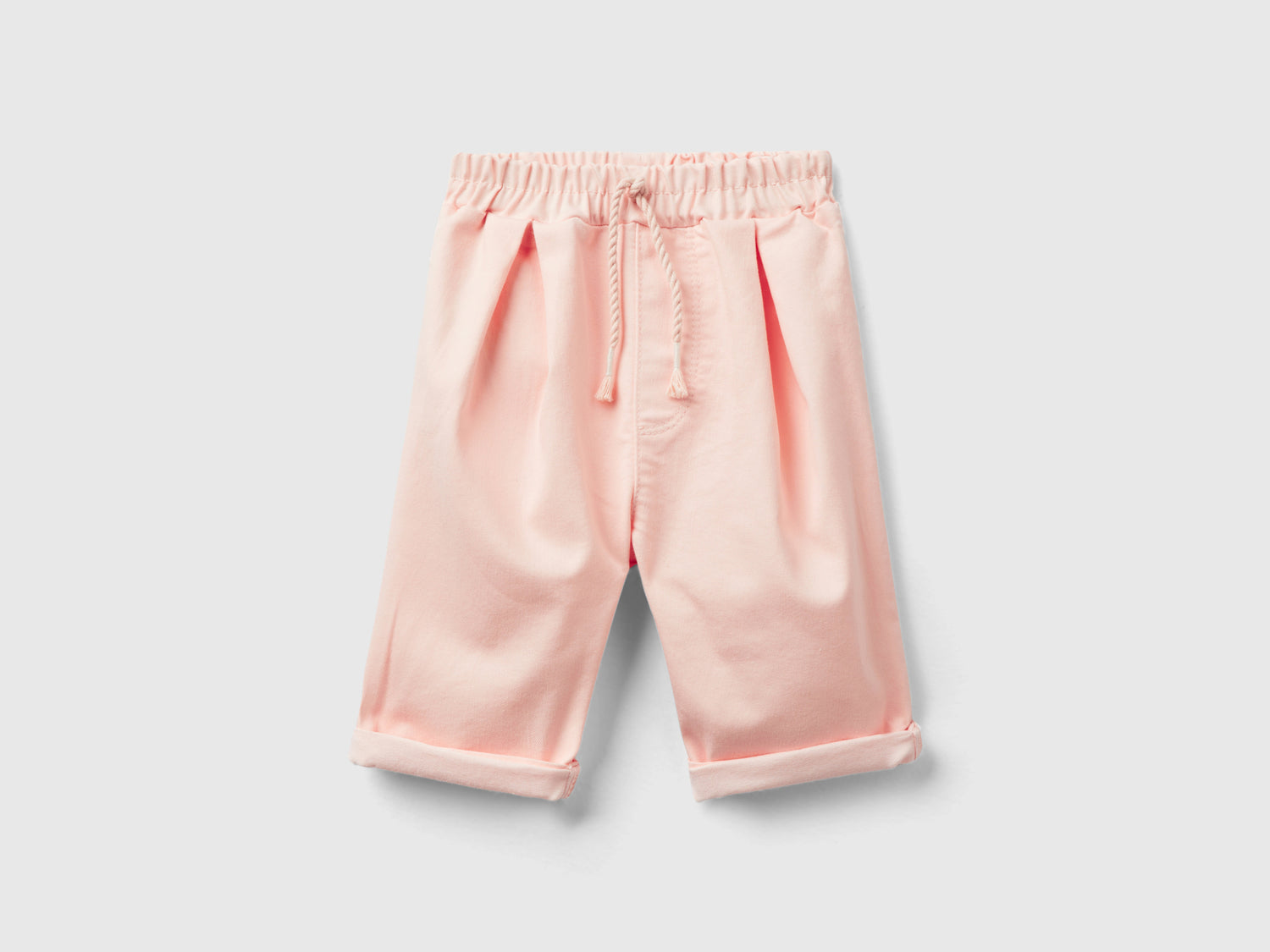 Pantaloni stretch con coulisse da neonato pesca | Benetton Outlet