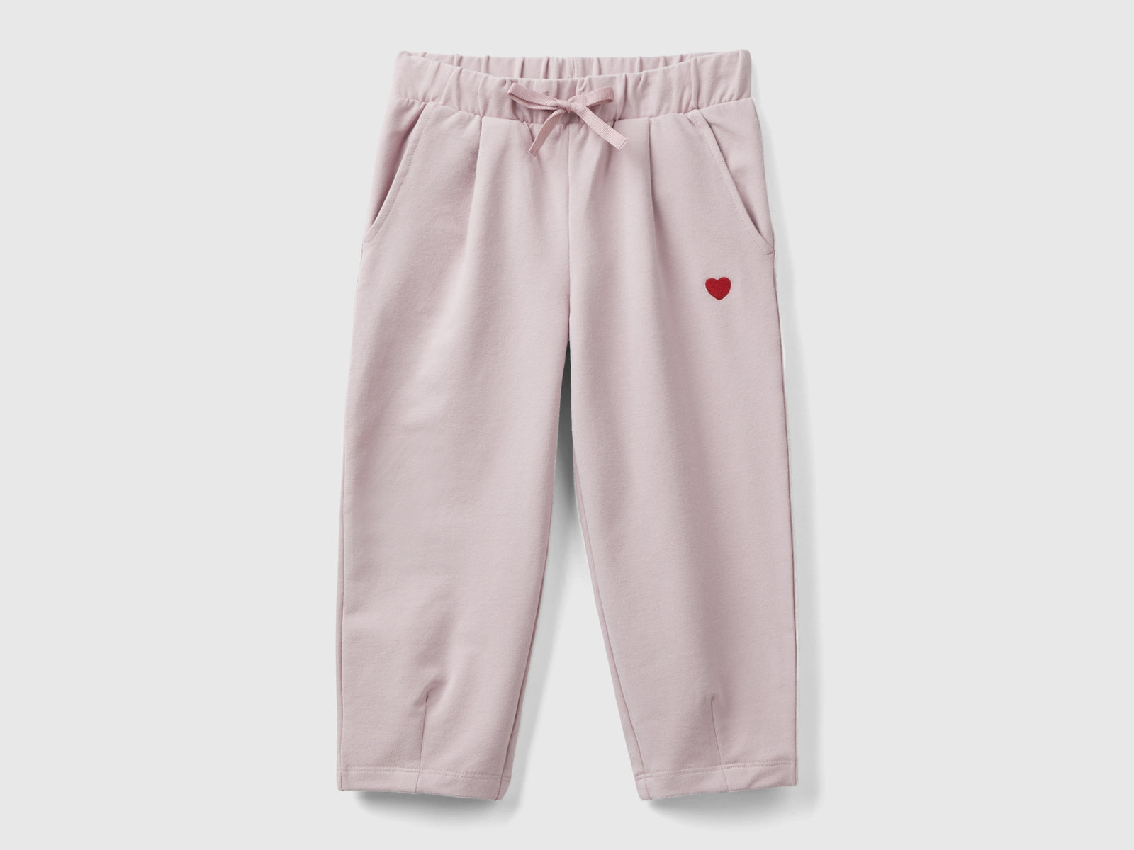 Joggers slim fit con ricamo da bimba rosa | Benetton Outlet