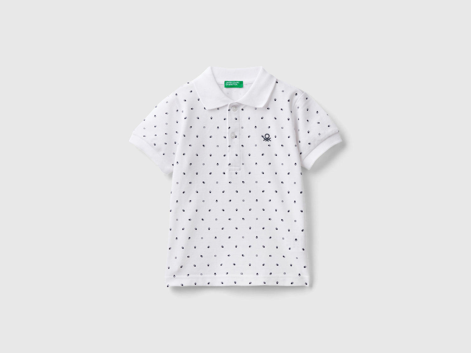 Polo micro fantasia slim fit da bimbo bianco | Benetton Outlet