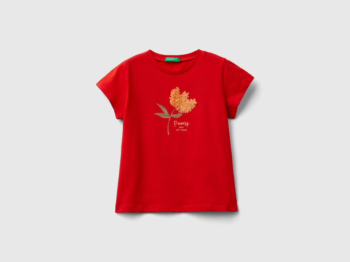 T-shirt con applicazione effetto petali
