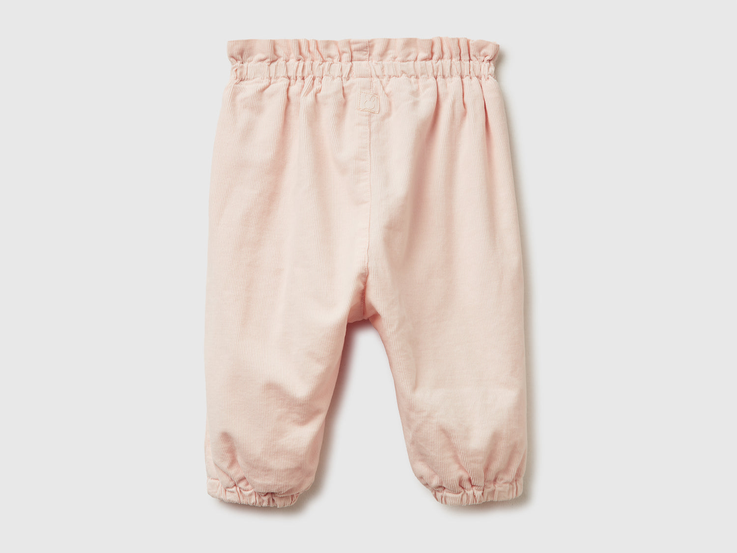 Pantaloni in velluto da neonato rosa tenue | Benetton Outlet
