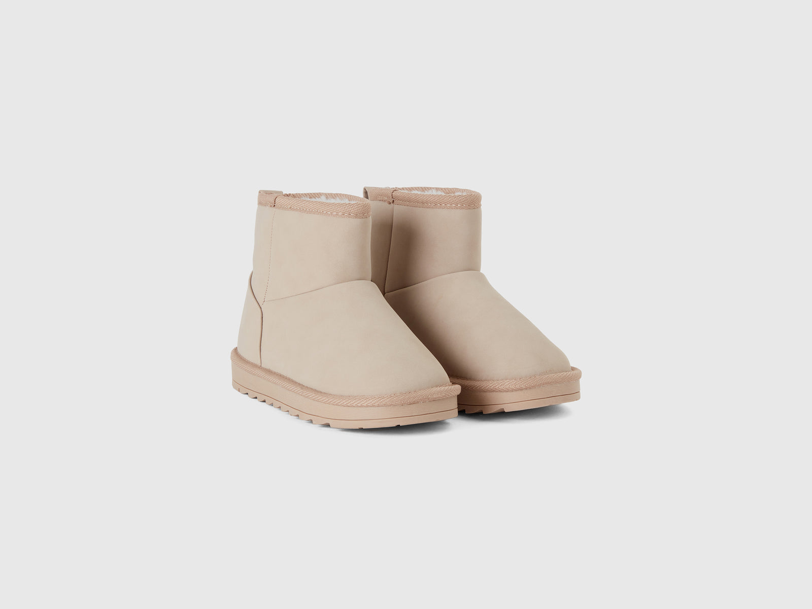 Tronchetti in tessuto spalmato da bambino beige 3 | Benetton Outlet