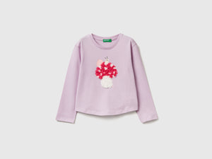 T-shirt con applicazione effetto petali