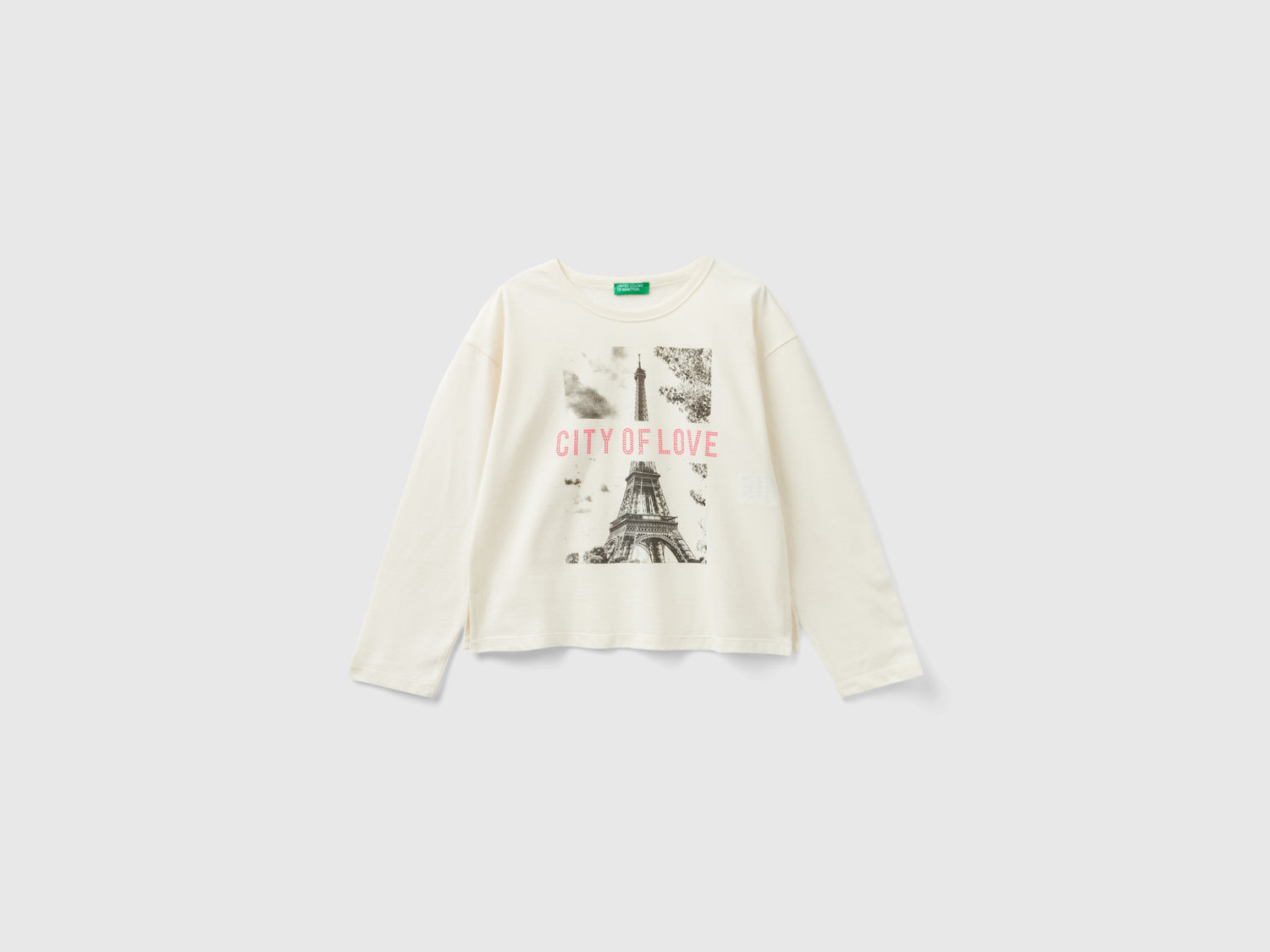 Maglietta con stampa e borchiette da bambina bianco panna | Benetton Outlet